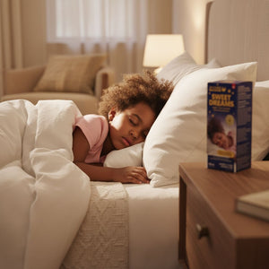 Child sleeping in bed with a box of cereal on the nightstand